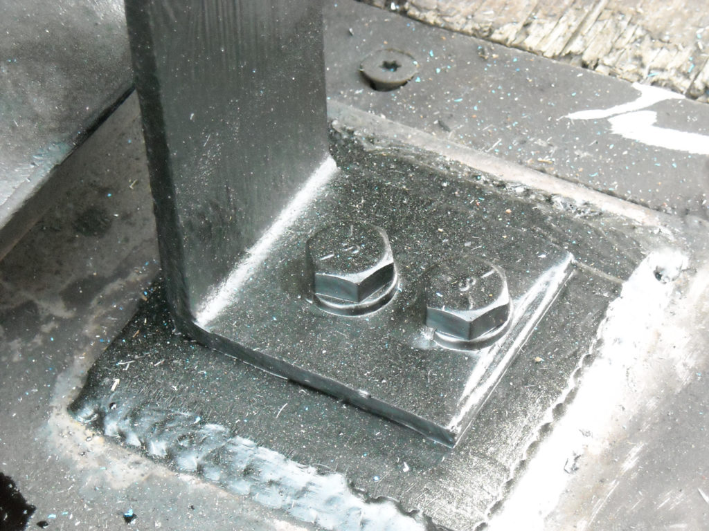 Water treatment tanks are welded to the trailer frame